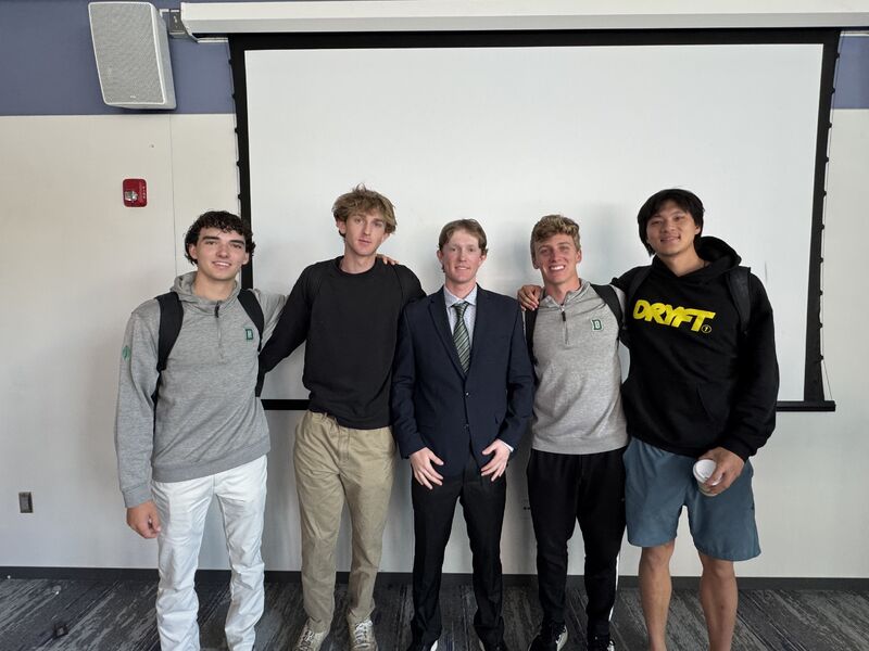 Cameron with four friends after the defense
